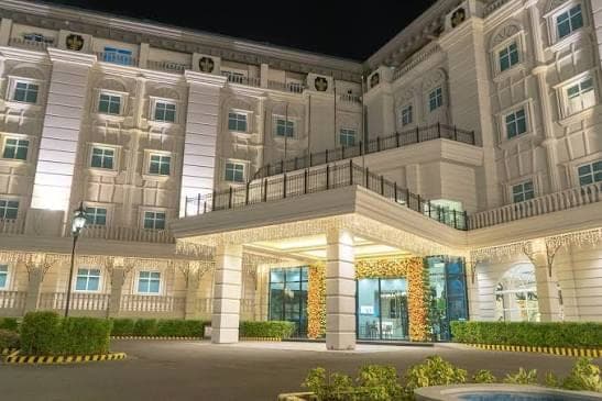 Exterior view of The Monarch Hotel in Calasiao, Pangasinan, Philippines, venue for the North Luzon Multi-District Convention 2026.
